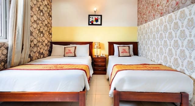 Deluxe Quadruple Room, Multiple Beds, Non Smoking, City View