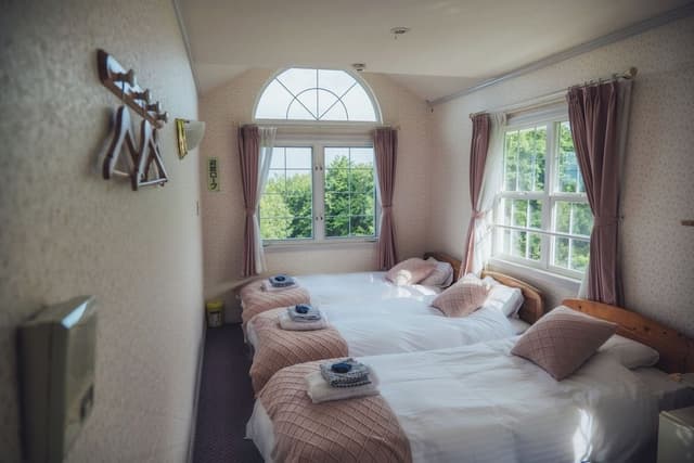 Economy Triple Room, 3 Twin Beds, Partial Sea View