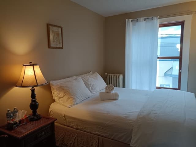 Classic Room, 1 Queen Bed, Shared Bath, Shared Living Space