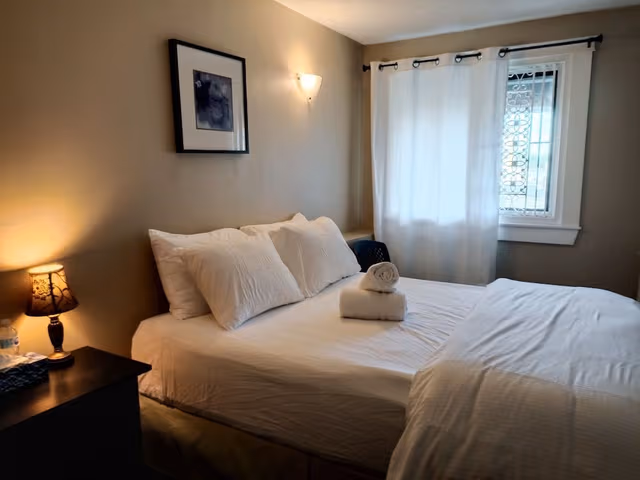 Classic Room, 1 Queen Bed, Shared Bath, Shared Living Space