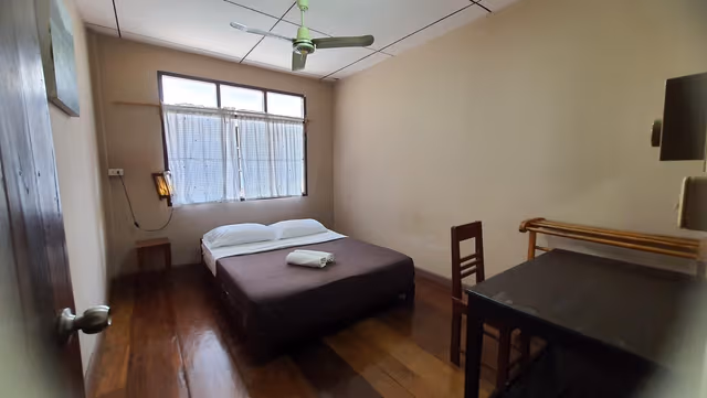 Fan Room with Shared Bathroom