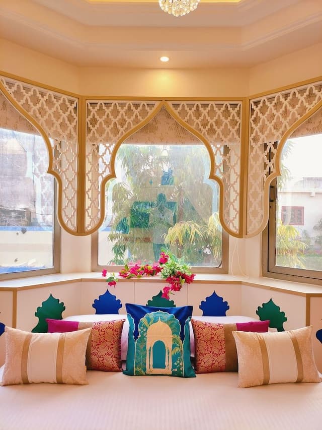 Mughal heritage room with 180 degree city view from Designer bed