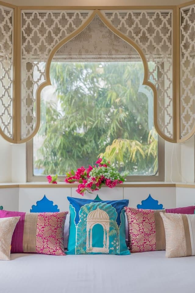 Mughal heritage room with 180 degree city view from Designer bed