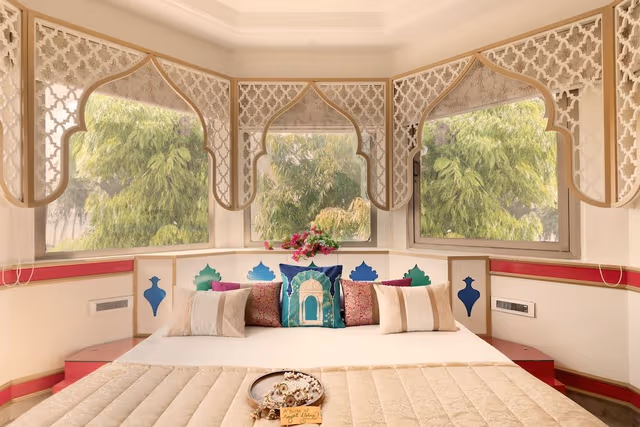 Mughal heritage room with 180 degree city view from Designer bed