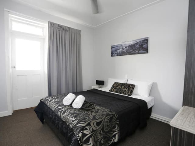 Queen Room with Shared Bathroom