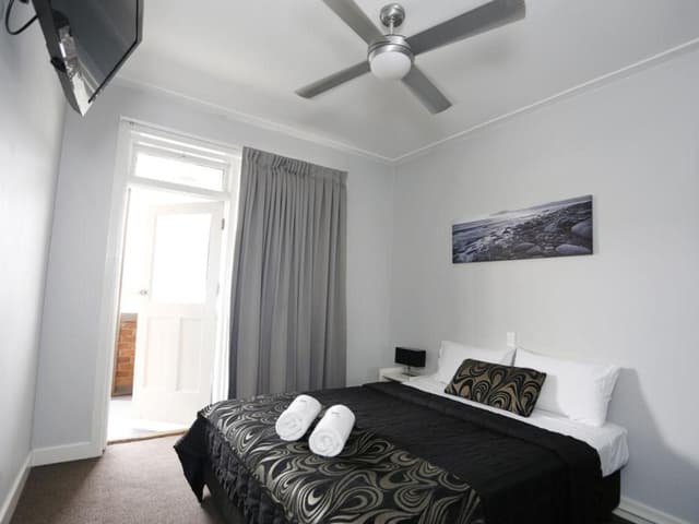 Queen Room with Shared Bathroom