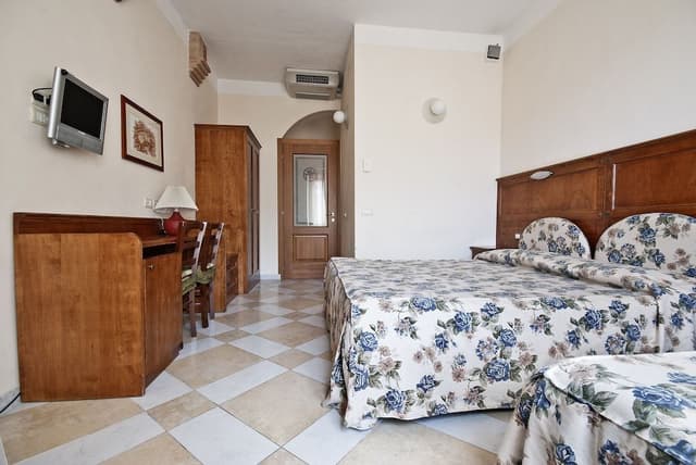 Quadruple Room, City View