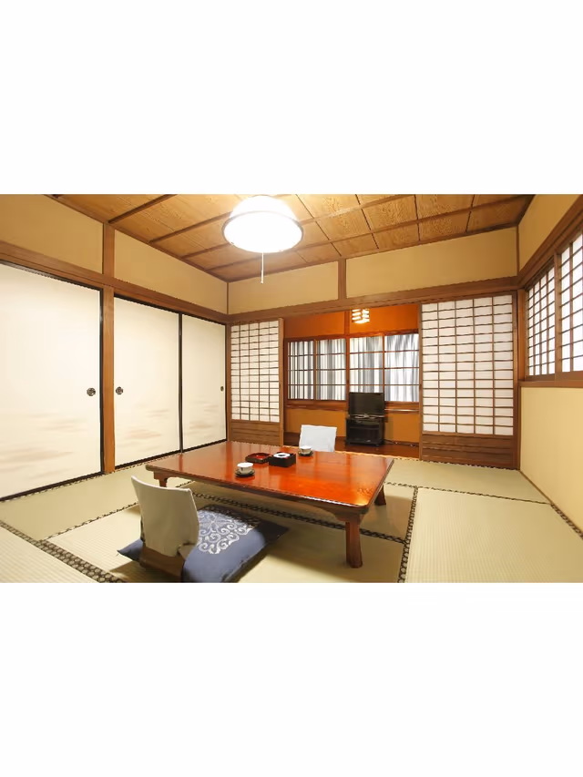 Japanese Style Family Room With Shared Bath