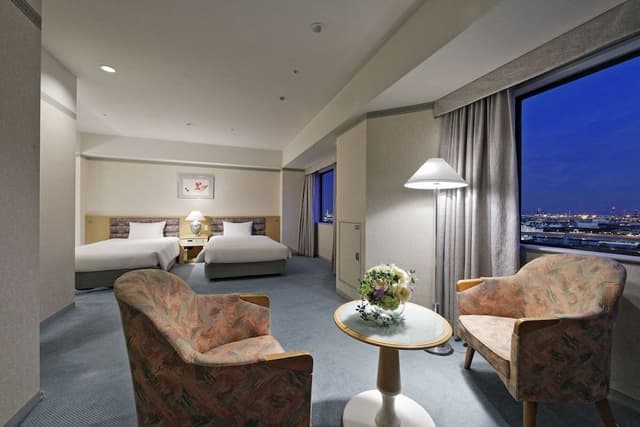 Quadruple Room (Deluxe Twin Room with 2 Extra Beds)