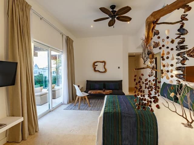 Junior Suite with Terrace and city view (2 Adults + 1 Child)