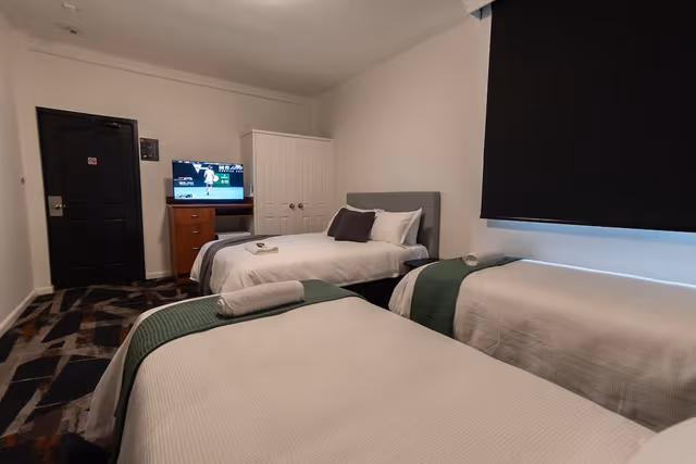 Queen + 2 Single Room