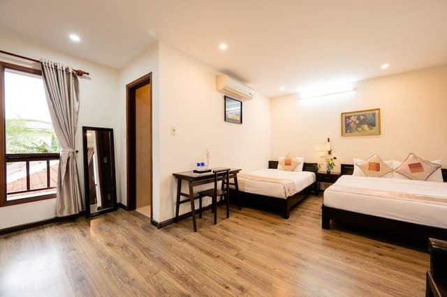 Deluxe Triple Room
