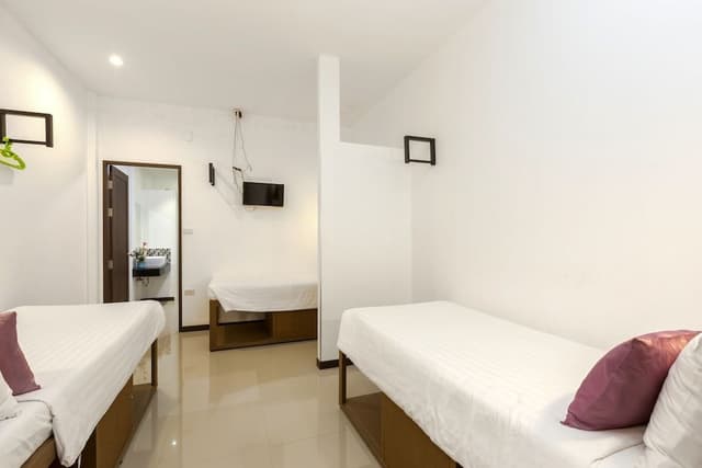 Deluxe Quadruple Suite (4 Adults and 2 Children under 6 years old sleeping for free in existing bed)