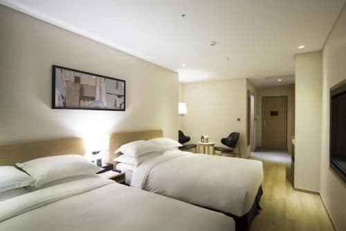 Deluxe Family Room with Partial Sea View