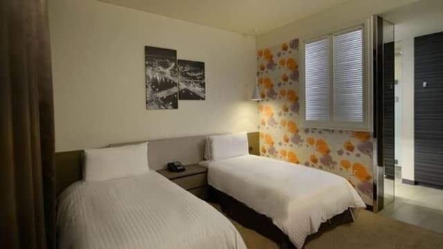 Deluxe Twin Room (No extra bed;Accept 1child each room:0-5Y stay free;6-11Y NTD700at front desk)