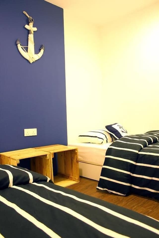 Private Twin Bed With Shared Bathroom