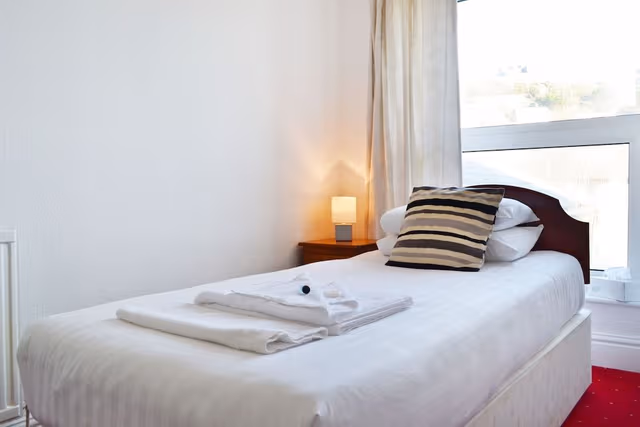 Single Room, Shared Bathroom