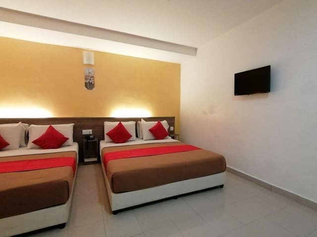 Deluxe Quadruple Room, 2 Queen Beds