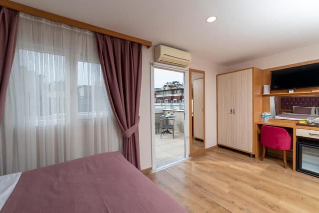 Quadruple Room with Balcony