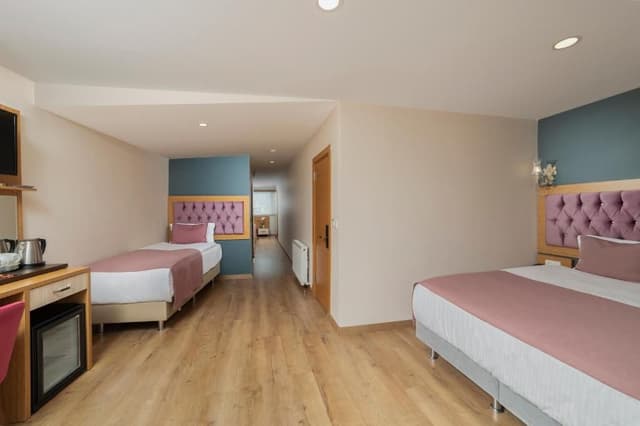 Quadruple Room with Balcony