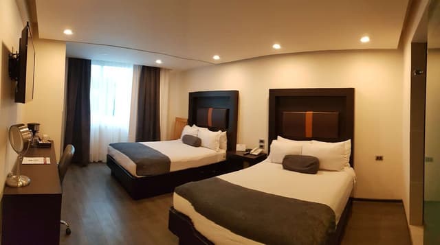 2 Double Beds, Non-Smoking, Hairdryer, Coffee Maker, Led Television, Wi-Fi, Continental Breakfast