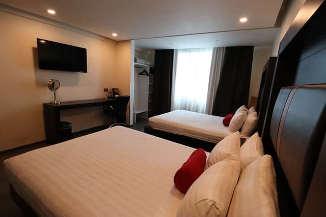 Suite-2 Double Beds, Non-Smoking, Sofa, High Speed Internet Access, Coffee Maker, Hairdryer, Iron And Ironing Board, Continental Breakfast