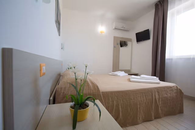 Quadruple Room, City View