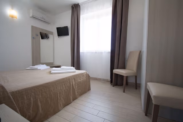 Quadruple Room, City View