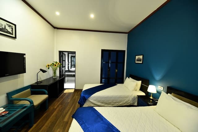 Deluxe Triple Room (with Internal Window)