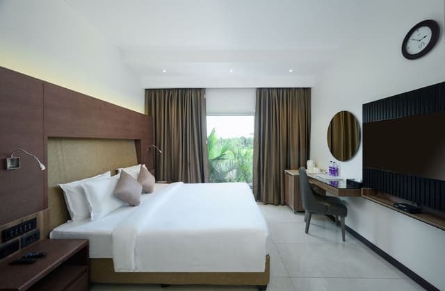 Deluxe king room with complimentary airport transfers