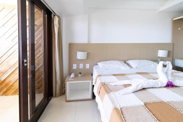 Apartamento com Vista Parcial Mar e Varanda