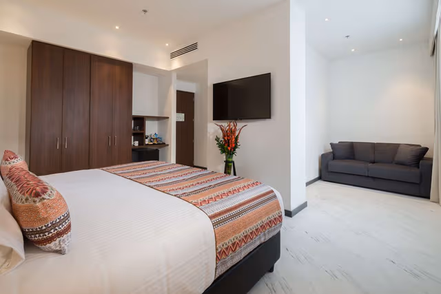 Suite-1 King Bed, Non-Smoking, Living Room, Coffee Maker, Mini Bar, Free Parking, Safe, Full Breakfast