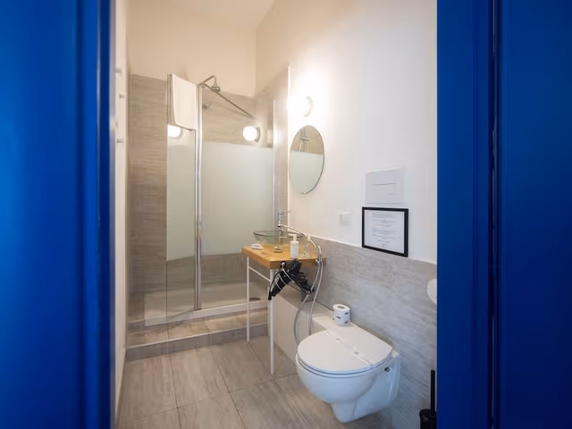 Deluxe Quadruple Room, Private Bathroom