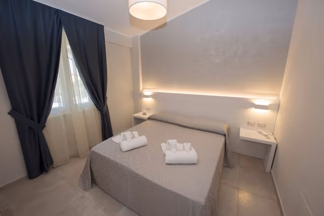 Deluxe Triple Room, 2 Bedrooms, Partial Ocean View, Garden Area