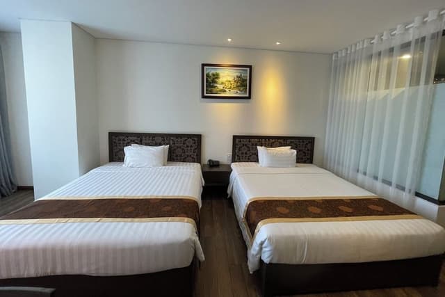Deluxe Quadruple Room, Partial Ocean View