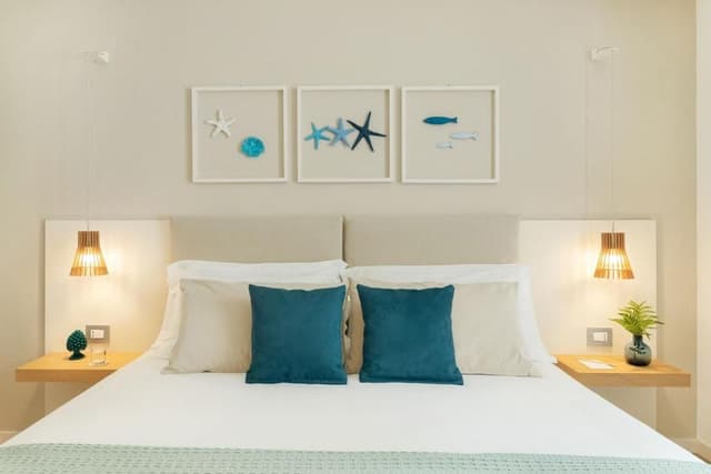 Superior Triple Room with Side Sea View