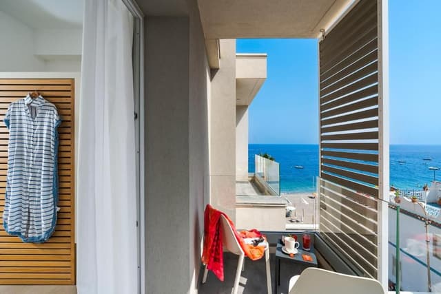 Superior Triple Room with Side Sea View