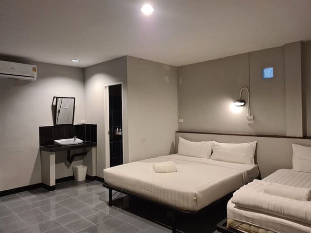 Triple 3 Single Beds with Private Bathroom