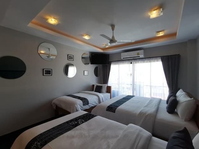 Deluxe Quadruple Room, City View