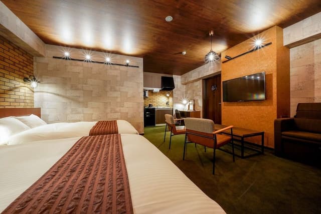 Theater room 2 Double beds with Sofa Bed-Brownstone (Check policies and room info before you book)