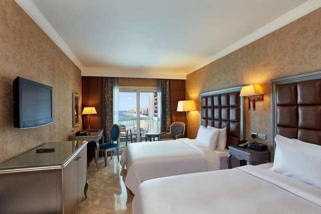 TWIN EXECUTIVE ROOM WITH PARTIAL SEA VIEW
