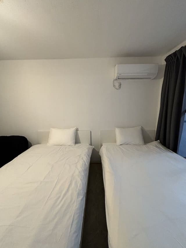 #07 Twin Room - Railroad Side (Shared Shower Room & Toilet)