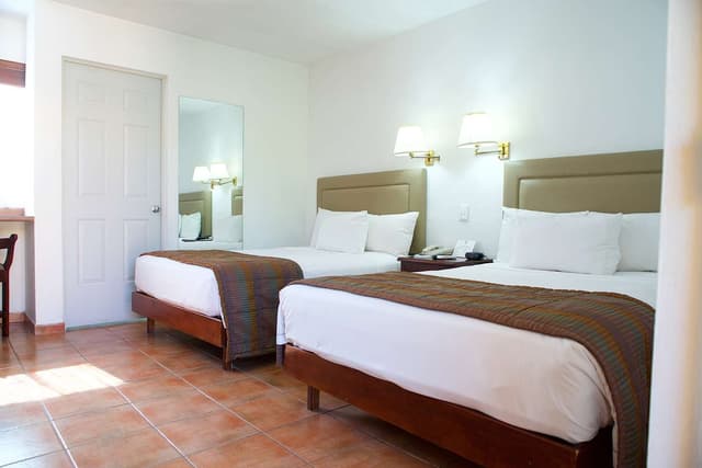 2 Double Beds, Non-Smoking, Desk, Microwave And Refrigerator, Coffee Maker, Iron And Ironing Board, Continental Breakfast