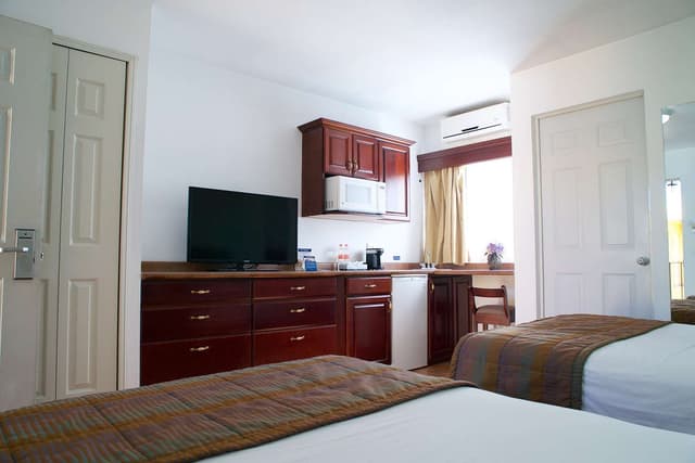 2 Double Beds, Non-Smoking, Desk, Microwave And Refrigerator, Coffee Maker, Iron And Ironing Board, Continental Breakfast
