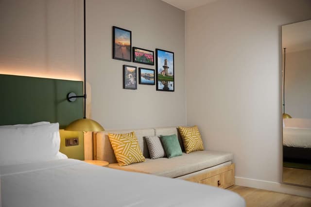 QUEEN ROOM WITH SOFA BED