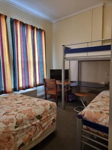 Quadruple Room with Shared Bathroom