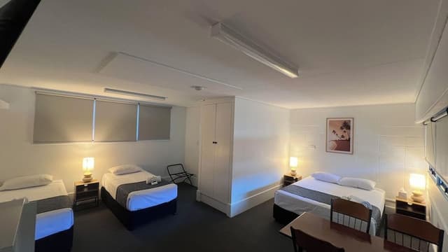 Family Room (1 double and 2 single beds)