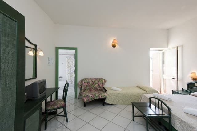 Economy Quadruple Room (Spa Access)