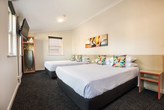 Economy Twin Queen with Shared Facilities