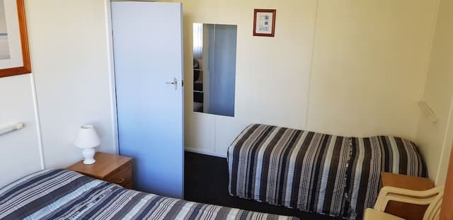 Two Bedroom Apartment - 1 Queen, 1 Double & 2 Single Beds